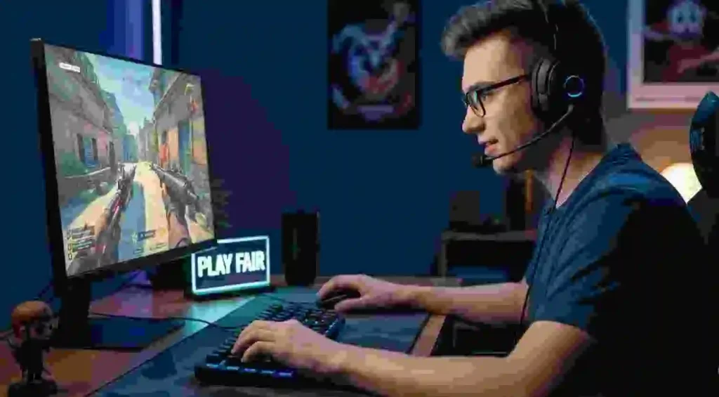 A young male gamer with a headset and glasses sits at a glowing desk, intently focused on a monitor displaying a first-person shooter game. A small, neon sign on his desk reads "PLAY FAIR," emphasizing the theme of integrity and honest gameplay in the esports world.